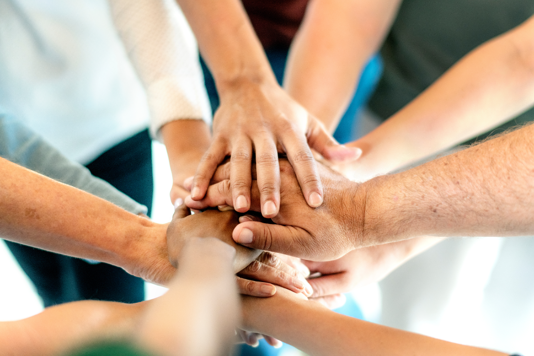 group-of-hands-supporting-together_340805549