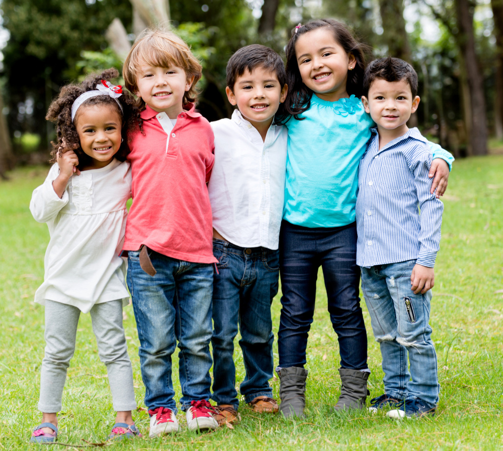 Happy group of children together at the park