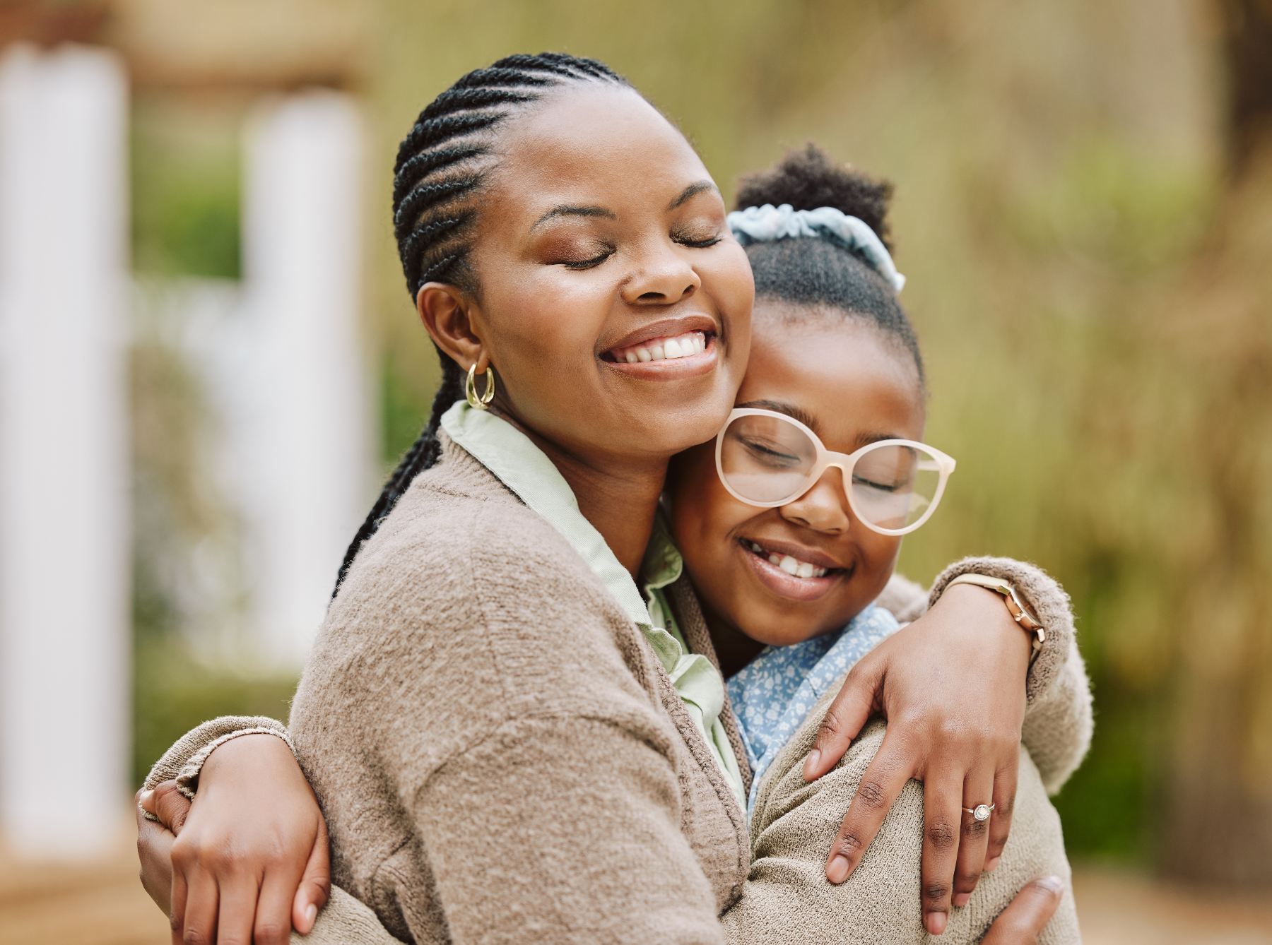 woman-and-child-hugging_596468564